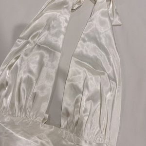 Sexy white satin top. Never worn. Perfect for a girls night out or date night!